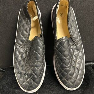 Calvin Klein Black Quilted women’s slip ons or Loafers
